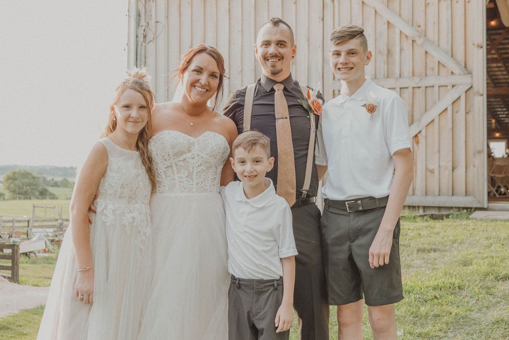 A family at a Columbus Ohio wedding venue barn
