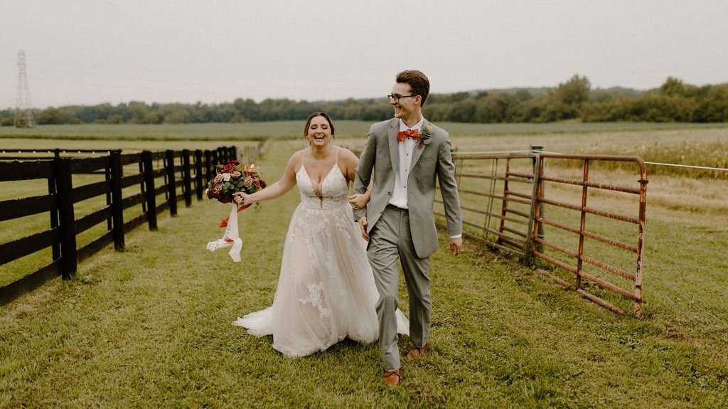 Bride and groom at their countryside outdoor wedding
