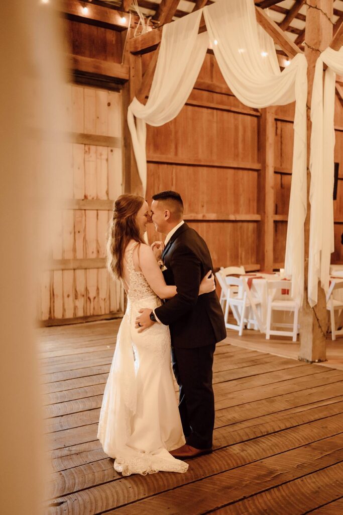 a bride and groom dancing in a barn wedding venue outside Columbus, Ohio.