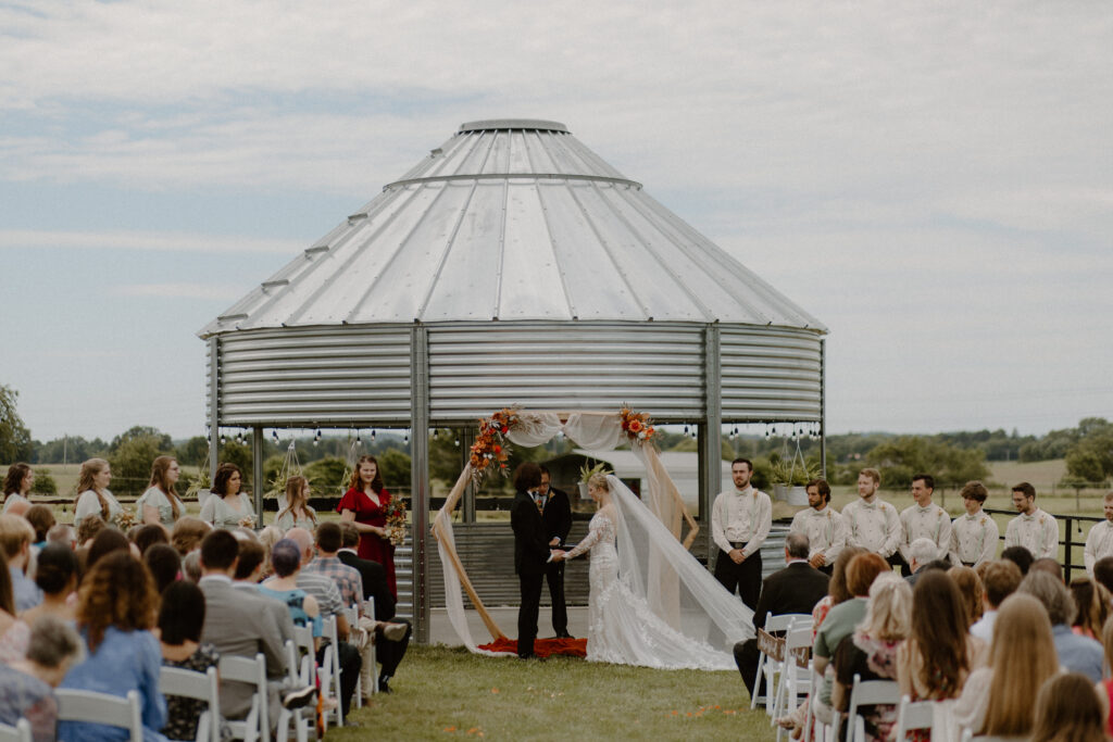 A bride and groom exchange vows at their charming Columbus, Ohio wedding.