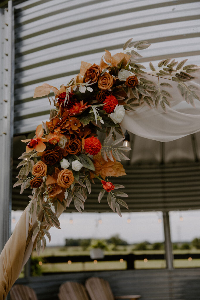 Flowers adorning a hexagonal arch for a boho chic Columbus, Ohio wedding.