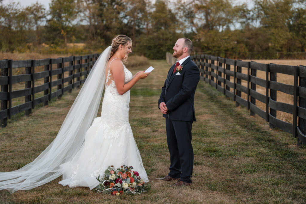 A wedding couple sharing their private vows at 22 Acres Farm, a Columbus, Ohio venue.