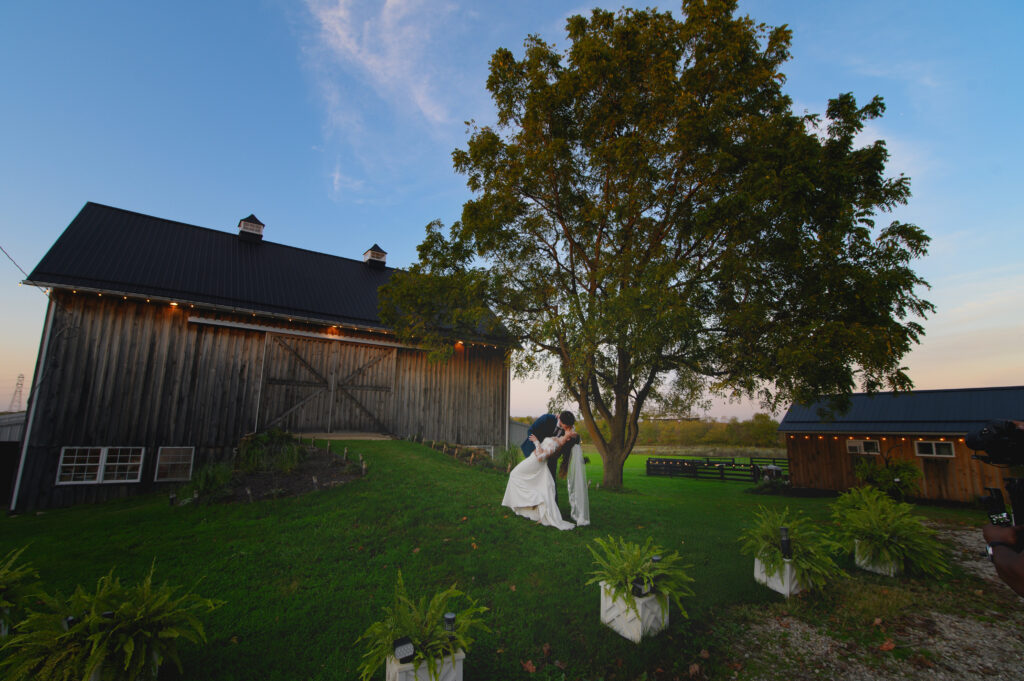 Outdoor Photography in front of historic barn at 22 Acres Farm Venue