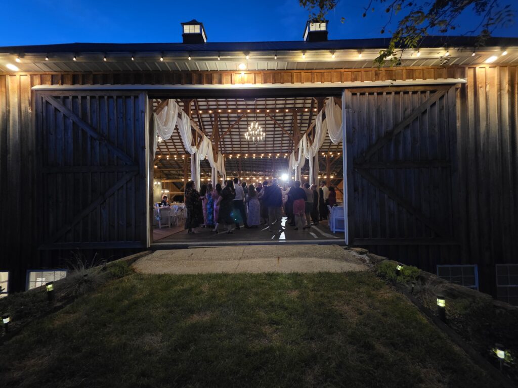 Indoor reception space in rustic Barn venue at 22 Acres Farm Venue in Newark, ohio